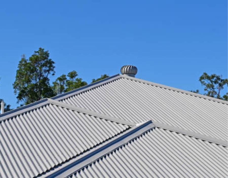 Industrial corrugated metal roof with ventilation system on a Maryland building