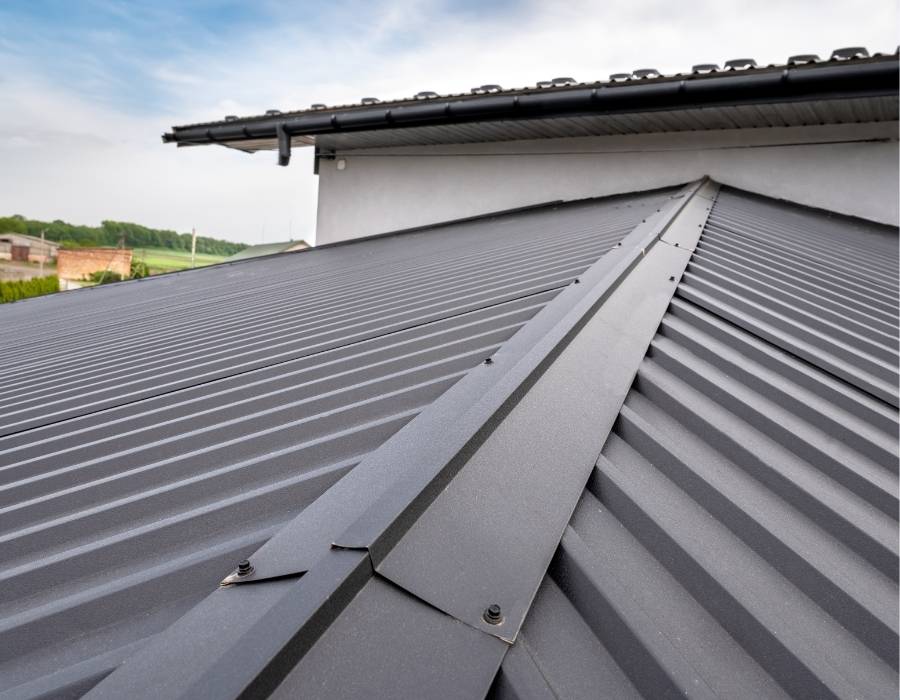 Modern black metal roofing panels on a residential home for durability and weather protection